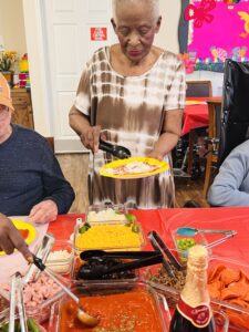 Sundara residents at build your own pizza bar