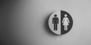 male and female signs for public restroom